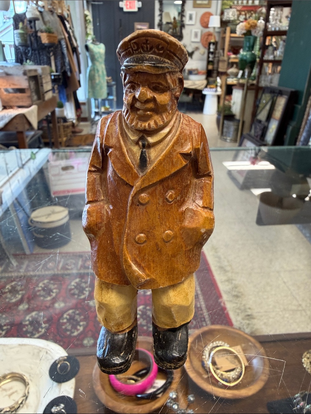 Hand-Carved Wooden Captain Figurine in Warm Brown and Black